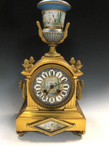 Lot 332 - A French 19th century ormolu and porcelain mantel clock