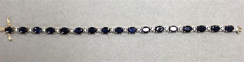 Lot 263 - A sapphire and diamond line bracelet
