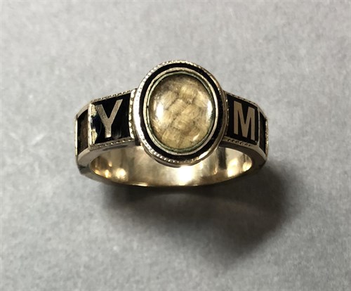 Lot 195 - A memorial enamel and hairwork ring