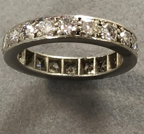 Lot 416 - A full hoop diamond set eternity ring