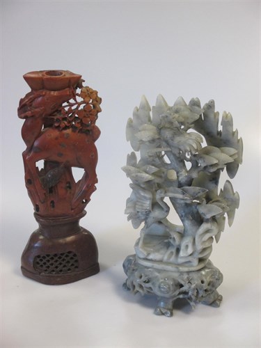 Lot 21 - A small collection of soapstone to include a...