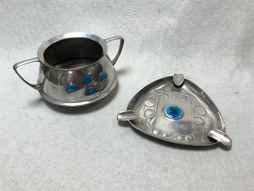 Lot 153 - Liberty & Co., a Tudric pewter and enamel ashtray, No. 0898