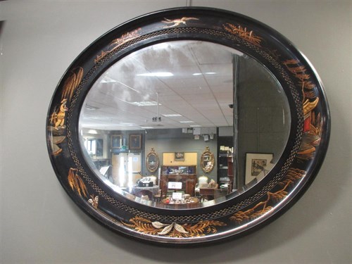Lot 372 - A black Chinoiserie oval framed wall mirror