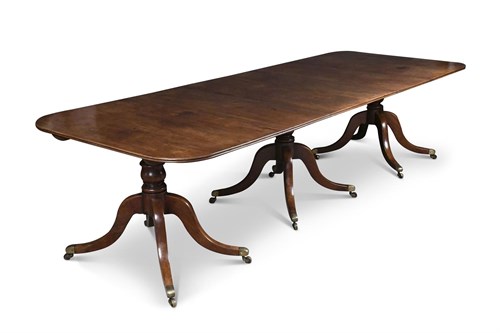Lot 379 - A Regency mahogany triple pedestal dining table