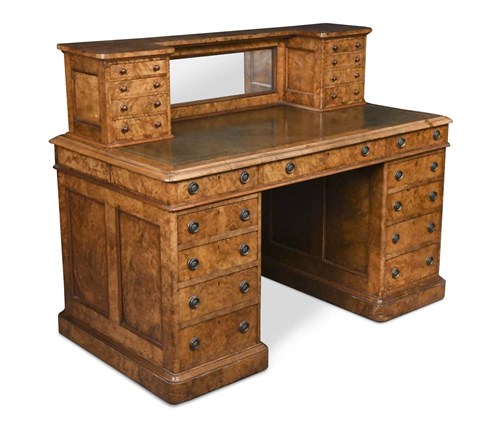 Lot 442 - A unusual mid-Victorian figured walnut pedestal writing desk