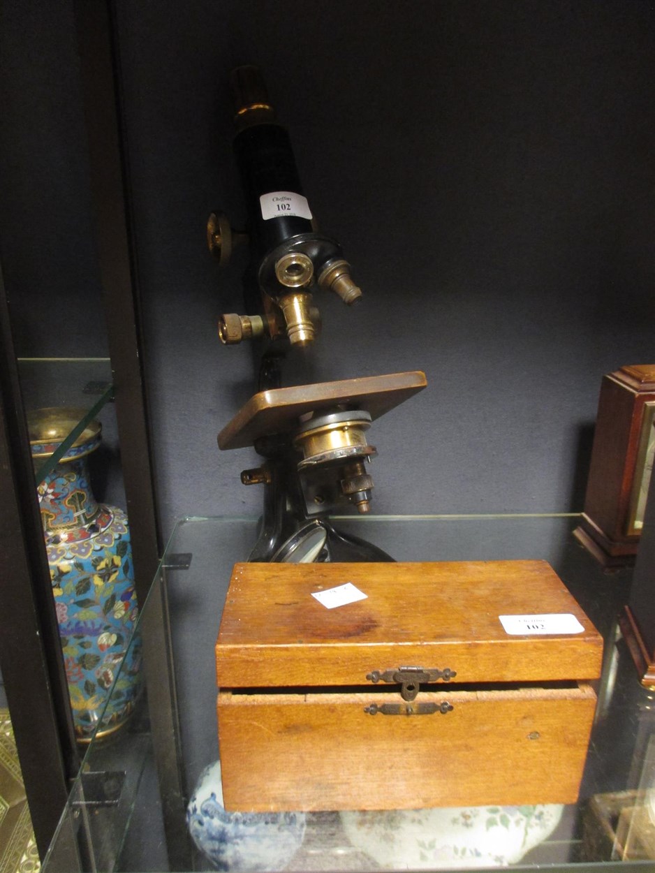 Lot 102 - A Watson Service microscope and a child's...
