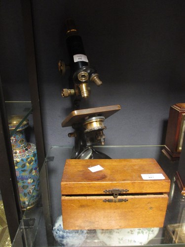 Lot 102 - A Watson Service microscope and a child's...