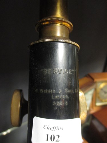 Lot 102 - A Watson Service microscope and a child's...