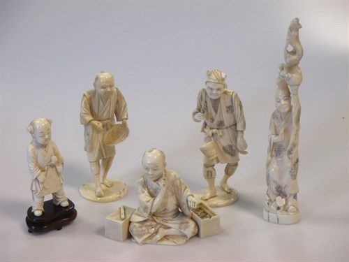 Lot 80 - Four Japanese Okimonos and a Chinese figure (5)