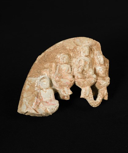 Lot 279 - A green marble Buddhist Stele depicting four seated figures of Buddha, Northern Qi dynasty