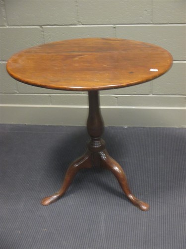 Lot 394 - A George III mahogany tilt-top tripod table,...