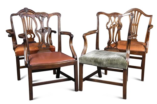 Lot 377 - A George III mahogany elbow dining chair with a carved back