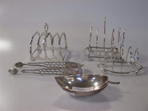 Lot 206 - Three silver toast racks, London 1900,...