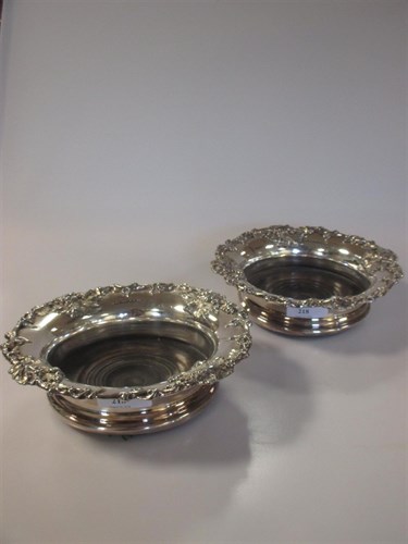 Lot 218 - A pair of old Sheffield plate wine coasters...