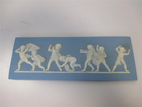 Lot 39 - A Wedgwood blue jasperware plaque, sprigged...