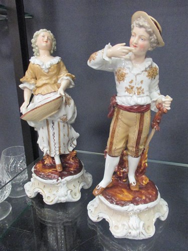 Lot 92 - A pair of Continental porcelain figures of a...