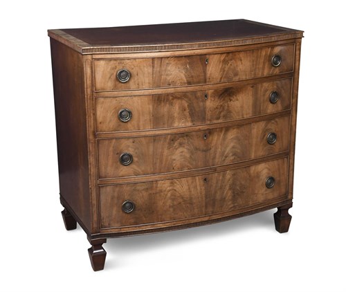 Lot 411 - A Regency mahogany bow front chest of drawers
