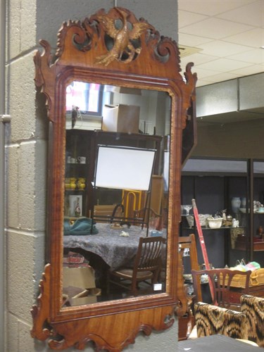 Lot 437 - An 18th century mahogany fret framed mirror,...