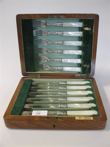 Lot 220 - A cased set of six silver and mother of pearl...