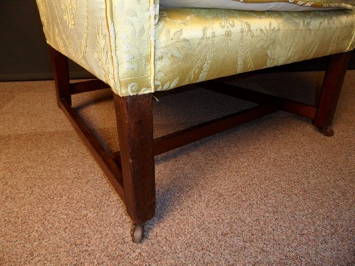 Lot 371 - A George III mahogany wing armchair