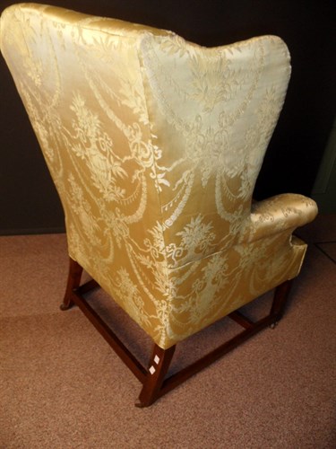 Lot 371 - A George III mahogany wing armchair