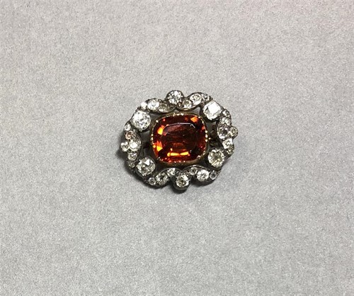 Lot 191 - A 19th century hessonite garnet and diamond cluster brooch