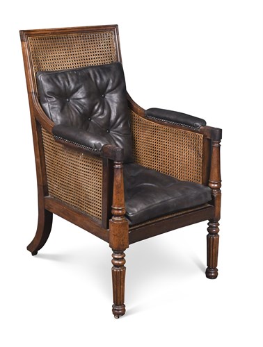 Lot 392 - A Regency mahogany library bergere, with brown...