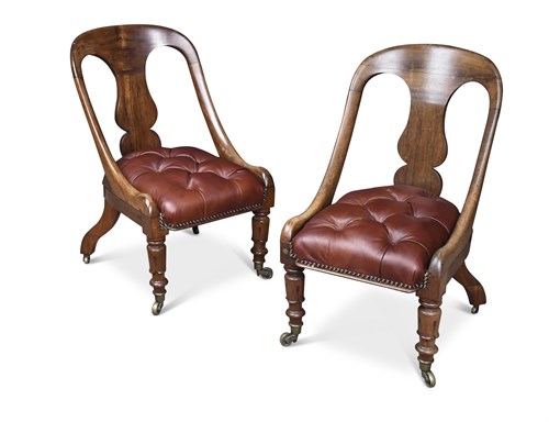 Lot 435 - A pair of Regency rosewood library chairs,...