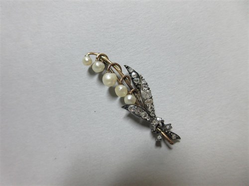 Lot 308 - A late 19th century diamond and pearl lily of the valley spray brooch
