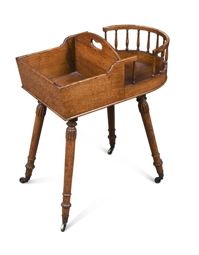 Lot 434 - A 19th century oak Butler's plate and flatware stand