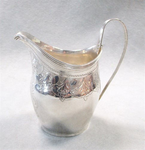 Lot 99 - A George III silver cream jug by the Batemans