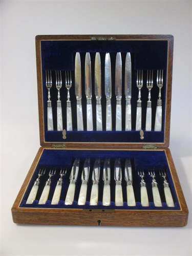 Lot 202 - A cased set of 12 pairs of EPNS fruit eaters...