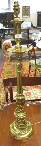Lot 398 - A 19th century brass altar candlestick,...