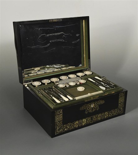 Lot 306 - A 19th century mother of pearl inlaid ebony dressing box with fittings