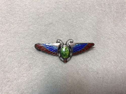Lot 99 - A silver and enamel scarab brooch by Charles Horner ltd, Chester, 1905