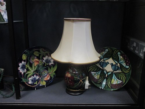 Lot 66 - A modern Moorcroft table lamp and two...