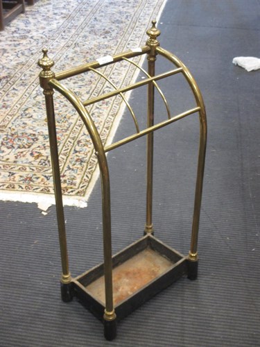 Lot 404 - A polished brass and iron stick stand