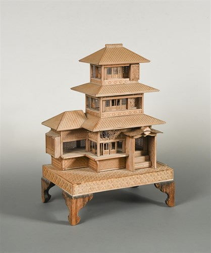 Lot 313 - A Malayan straw work model of a temple,...