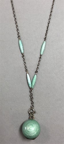 Lot 317 - An enamel ball locket and chain