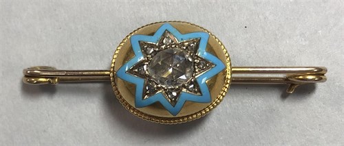 Lot 318 - A diamond and enamel bombé pin brooch