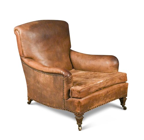 Lot 432 - A Howard type leather easy armchair