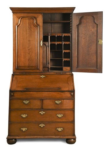 Lot 360 - An 18th century oak bureau cabinet