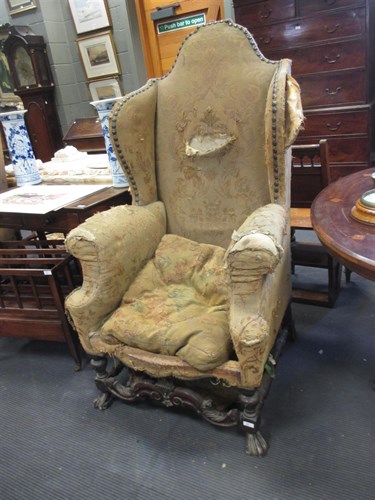 Lot 408 - A pair of William and Mary style wing back...