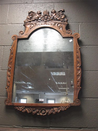 Lot 416 - A 17th century style walnut framed mirror...