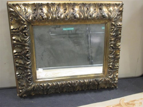 Lot 377 - A Baroque style leaf moulded framed mirror, 41...
