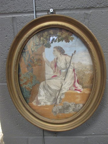Lot 254 - A George III oval silk and wool work picture...