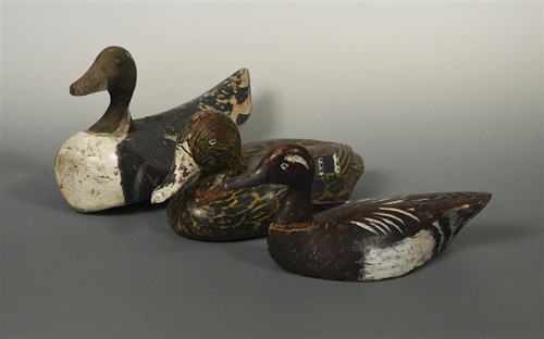 Lot 257 - Three carved and painted wood duck decoys