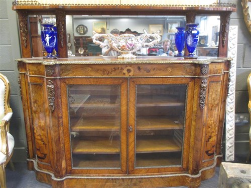 Lot 327 - A 19th century mirror back walnut credenza