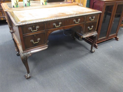 Lot 349 - An early 20th century leather inset mahogany...