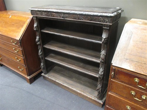 Lot 607 - A late 19th century carved oak bookcase, 112 x...